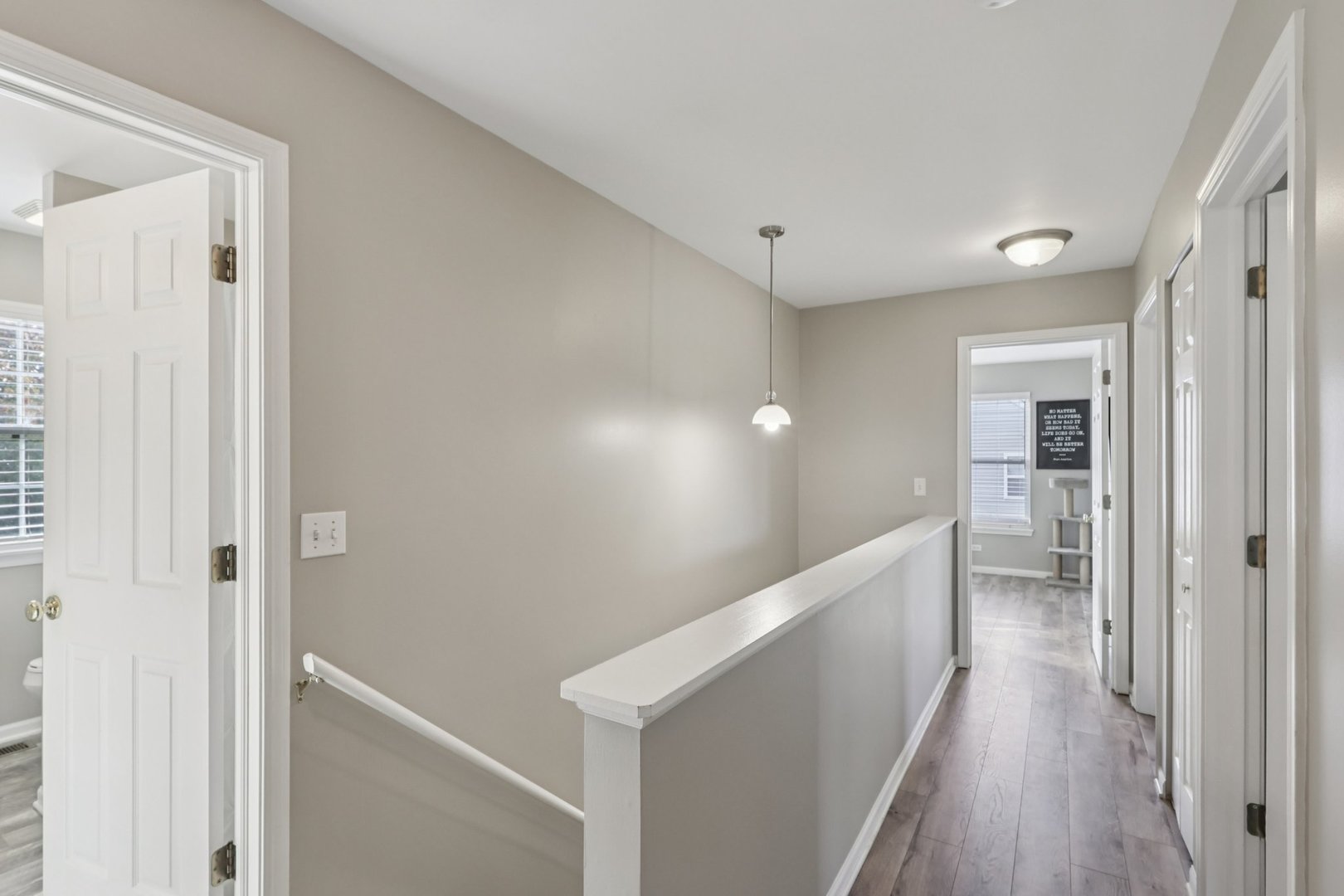 11680 Cape Cod Lane Huntley, IL 60142 - Photo 19 of 47 a view of hallway with wooden floor