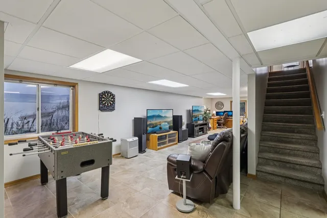 a living room with furniture and a table