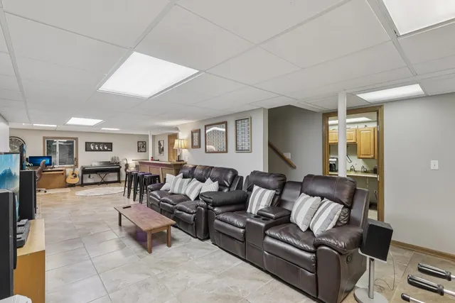 a view of a livingroom with furniture and closet