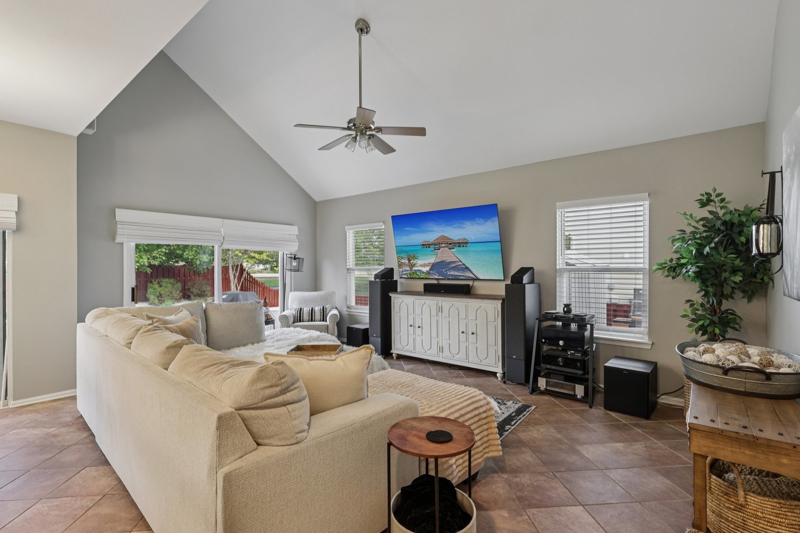 11680 Cape Cod Lane Huntley, IL 60142 - Photo 5 of 47 a living room with furniture a window and a flat screen tv
