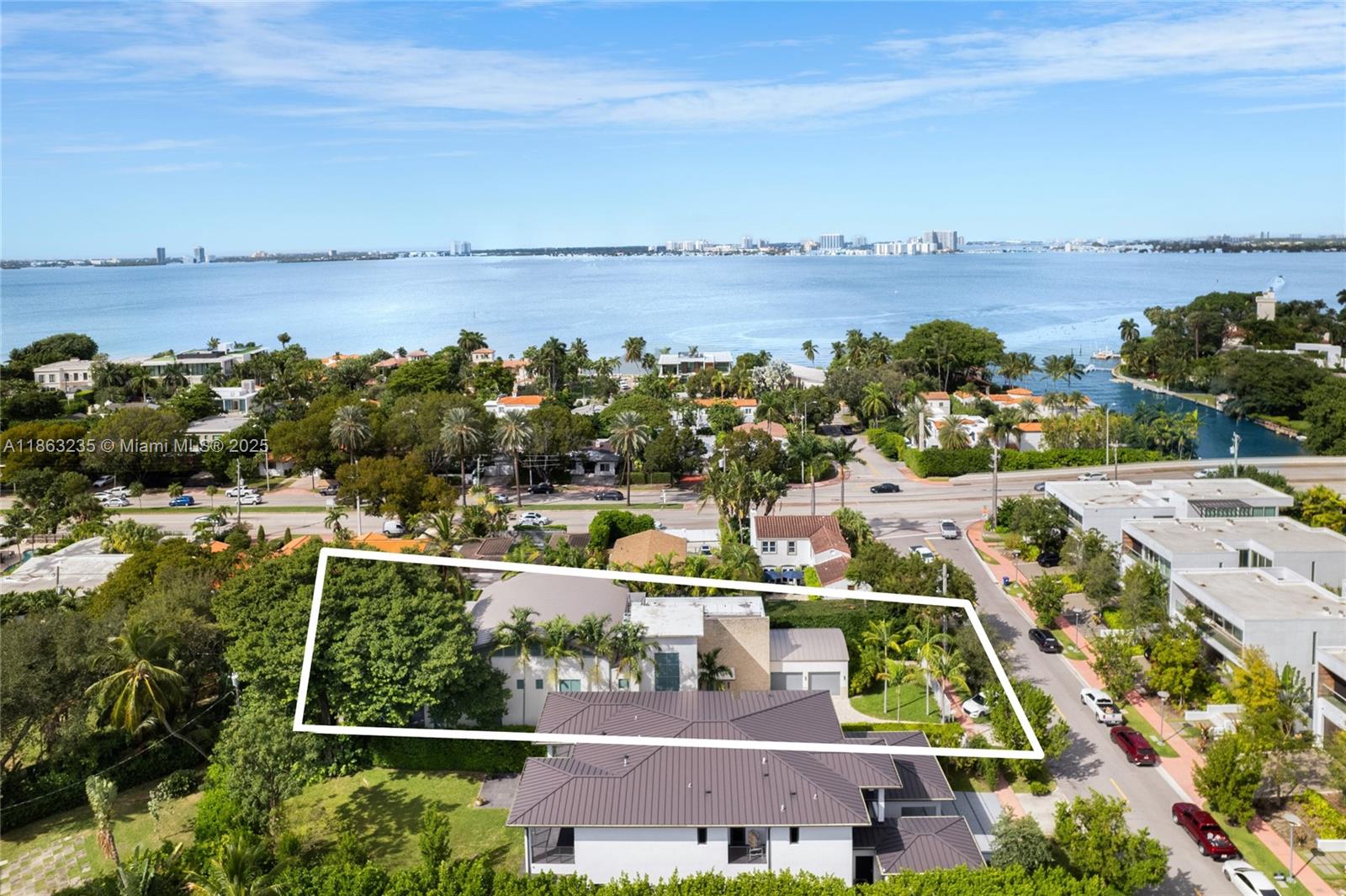 980 West 48th Street Miami Beach, FL 33140 - Photo 5 of 10 an aerial view of houses with yard