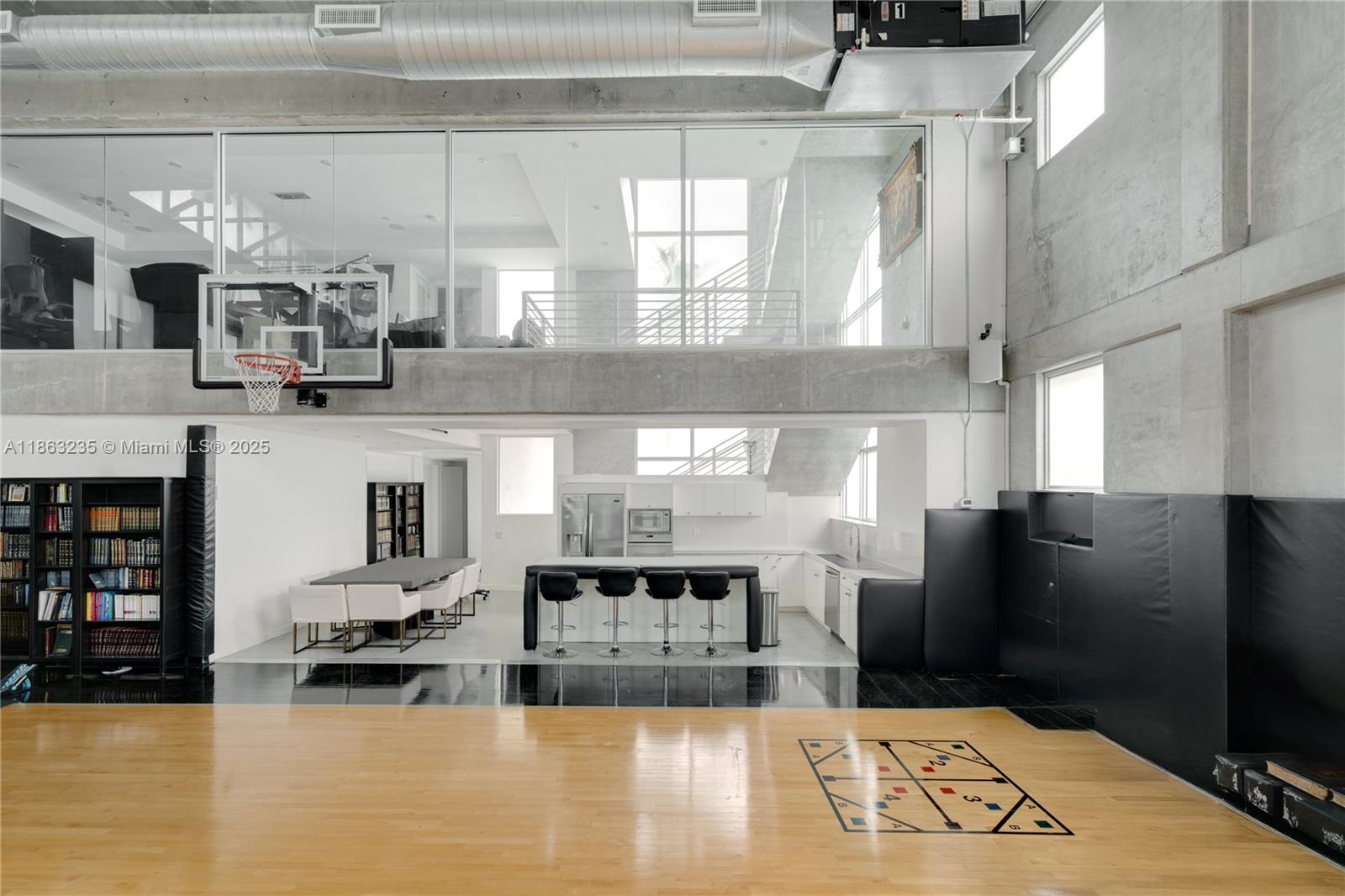 980 West 48th Street Miami Beach, FL 33140 - Photo 10 of 10 a kitchen with stainless steel appliances granite countertop a refrigerator and a stove