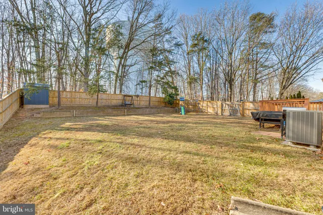 a view of swimming pool with seating area