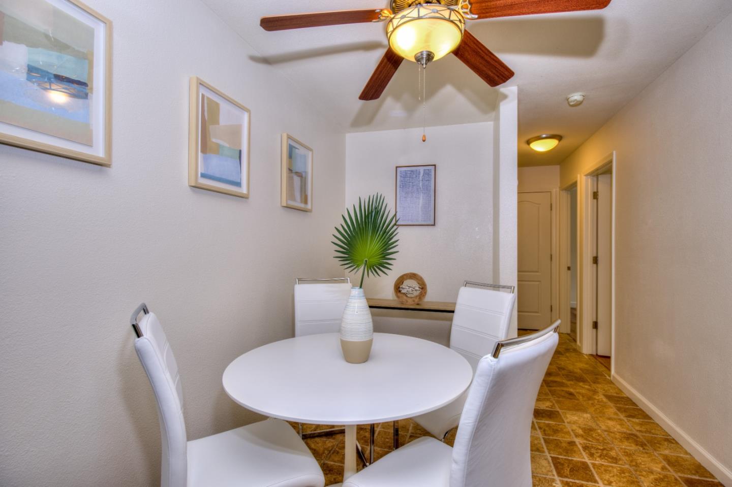464 Dempsey Road, Unit 264 Milpitas, CA 95035 - Photo 11 of 16 a view of a dining room with a table and chairs
