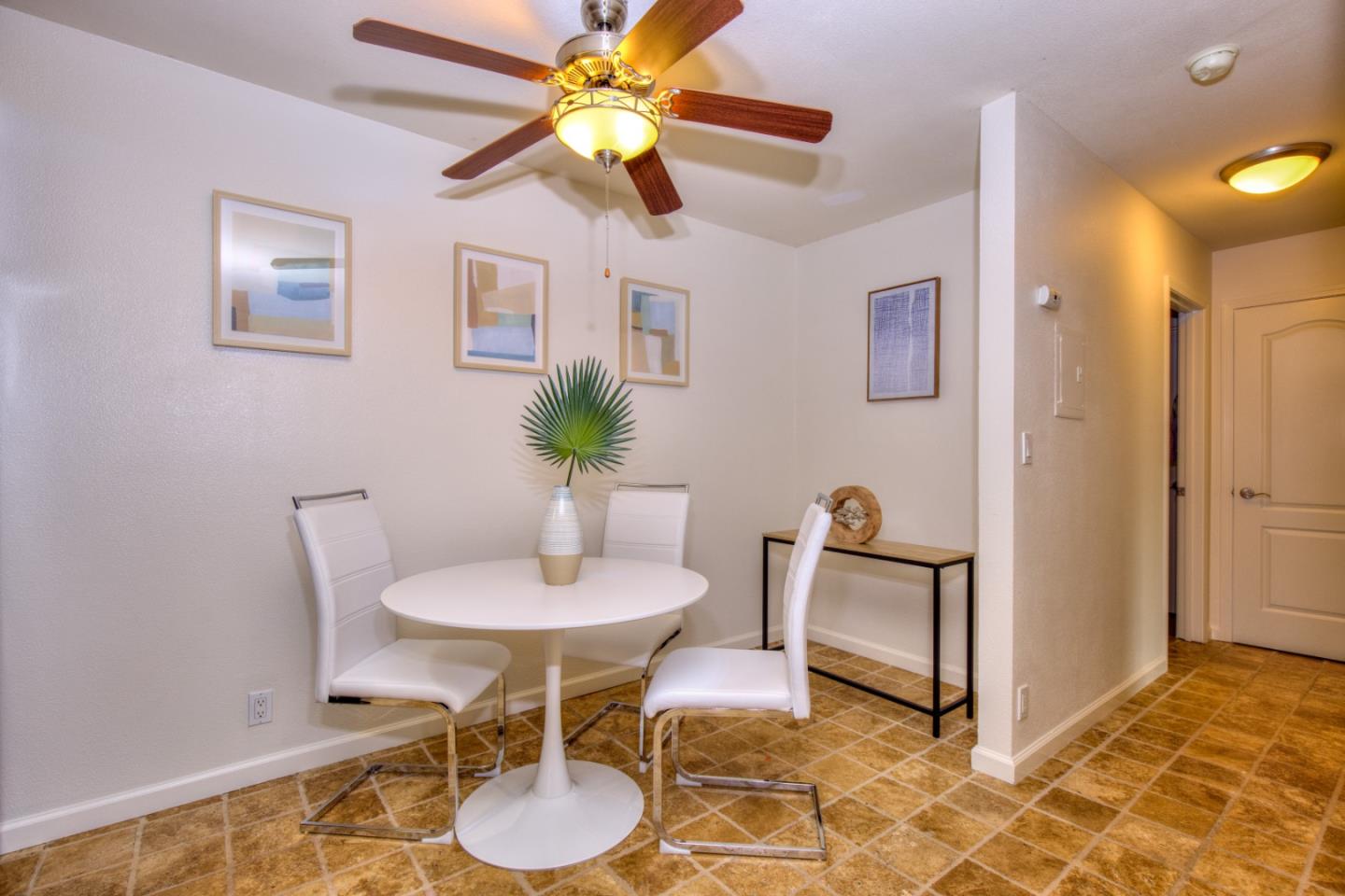 464 Dempsey Road, Unit 264 Milpitas, CA 95035 - Photo 7 of 16 a dining room with furniture and window