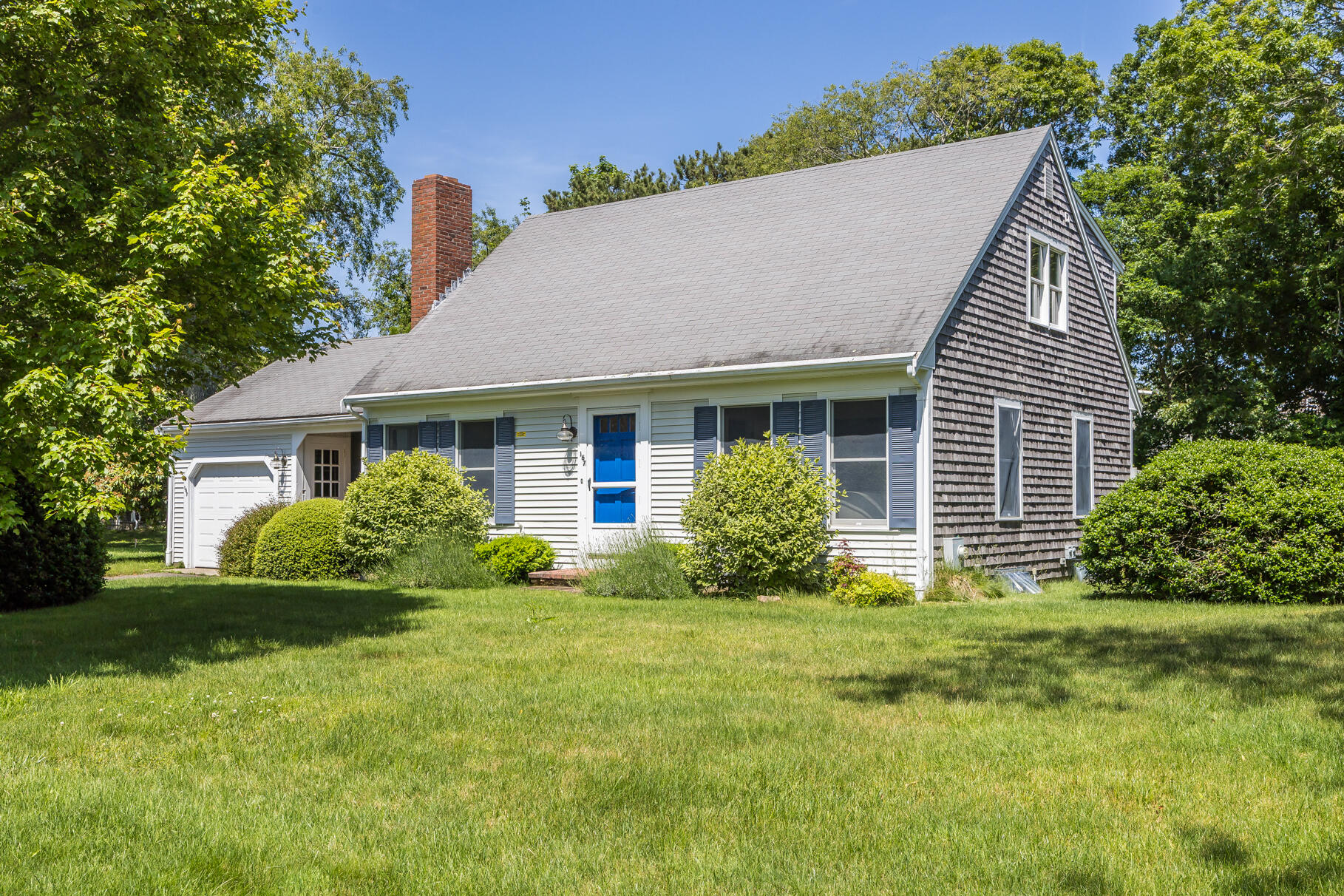 167 Ambergris Circle Brewster, MA 02631 - Photo 1 of 89 a front view of house with yard and green space