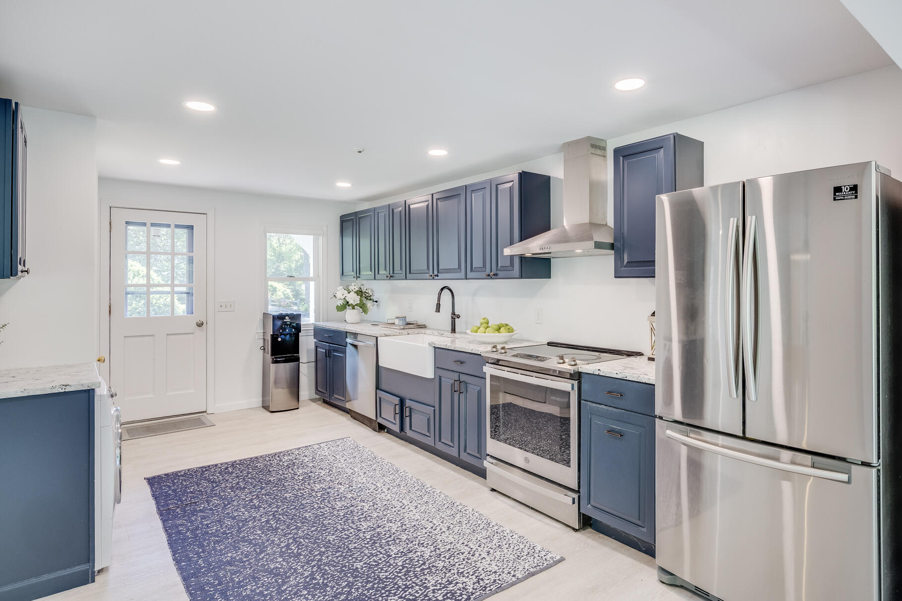 167 Ambergris Circle Brewster, MA 02631 - Photo 14 of 89 a kitchen with stainless steel appliances granite countertop a refrigerator sink and stove
