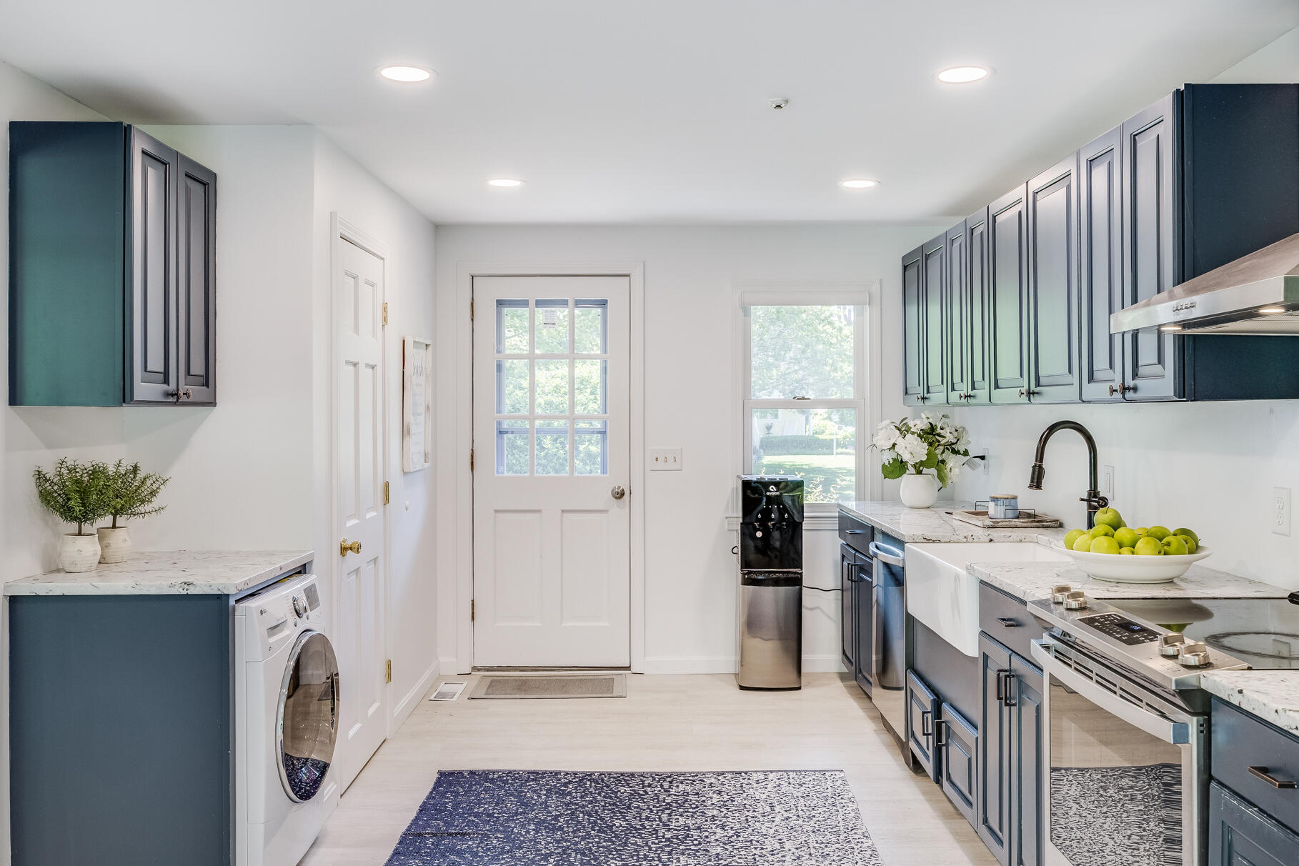 167 Ambergris Circle Brewster, MA 02631 - Photo 15 of 89 a kitchen with stainless steel appliances granite countertop a stove a sink and a refrigerator