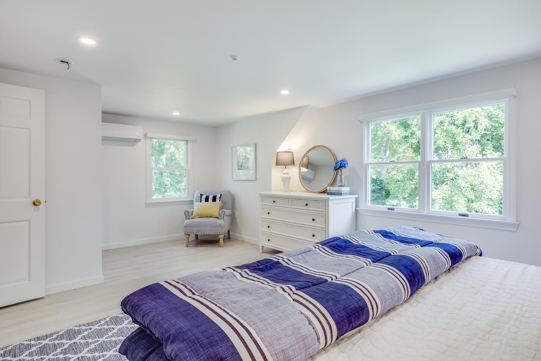 167 Ambergris Circle Brewster, MA 02631 - Photo 48 of 89 a bedroom with a large bed and windows