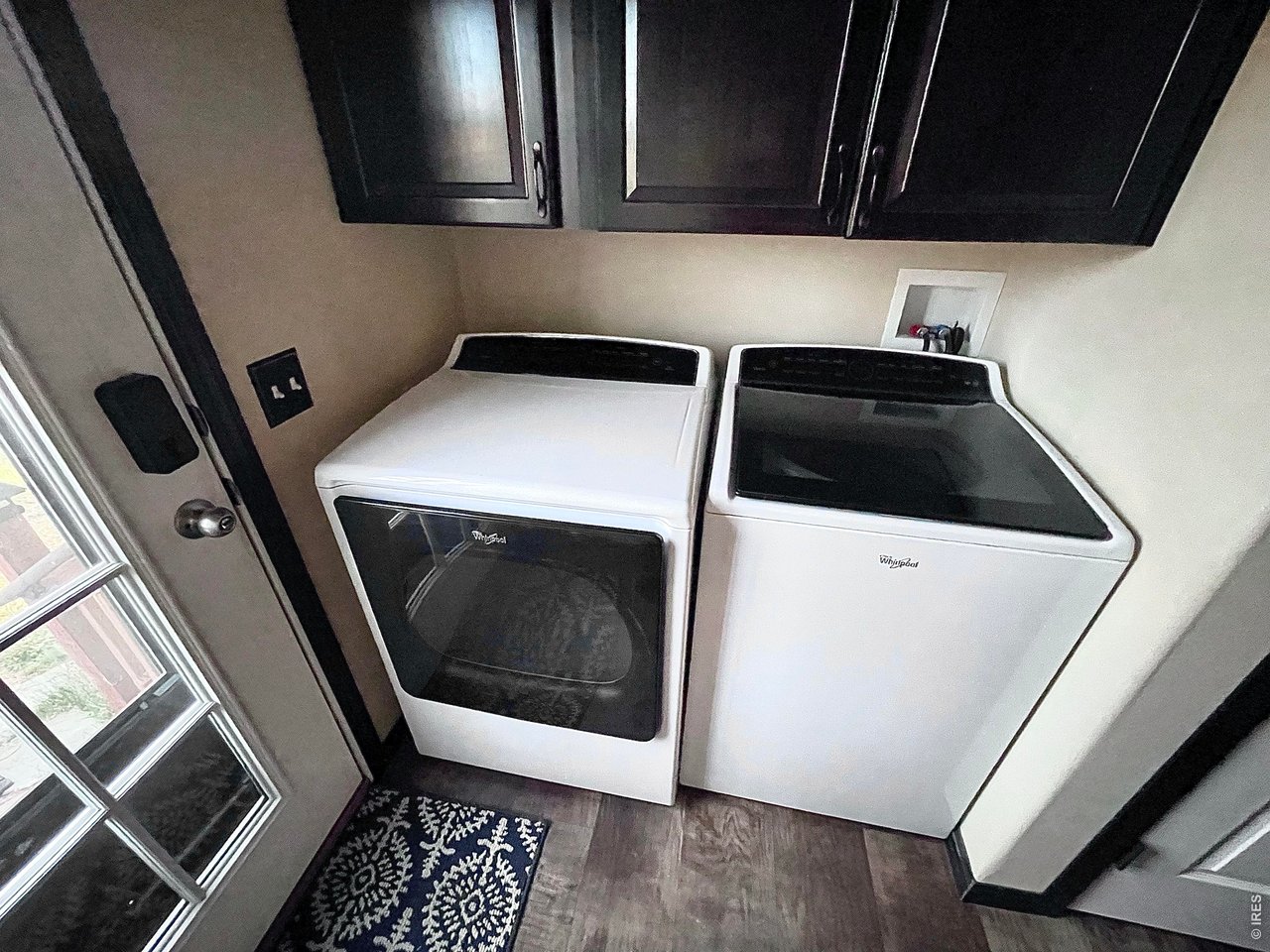892 Stratton Park Road Bellvue, CO 80512 - Photo 18 of 27 a utility room with dryer and washer