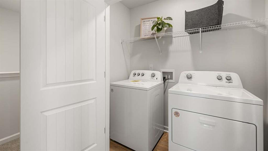 4937 Jatoba Road Acworth, GA 30101 - Photo 19 of 22 a utility room with dryer and washer