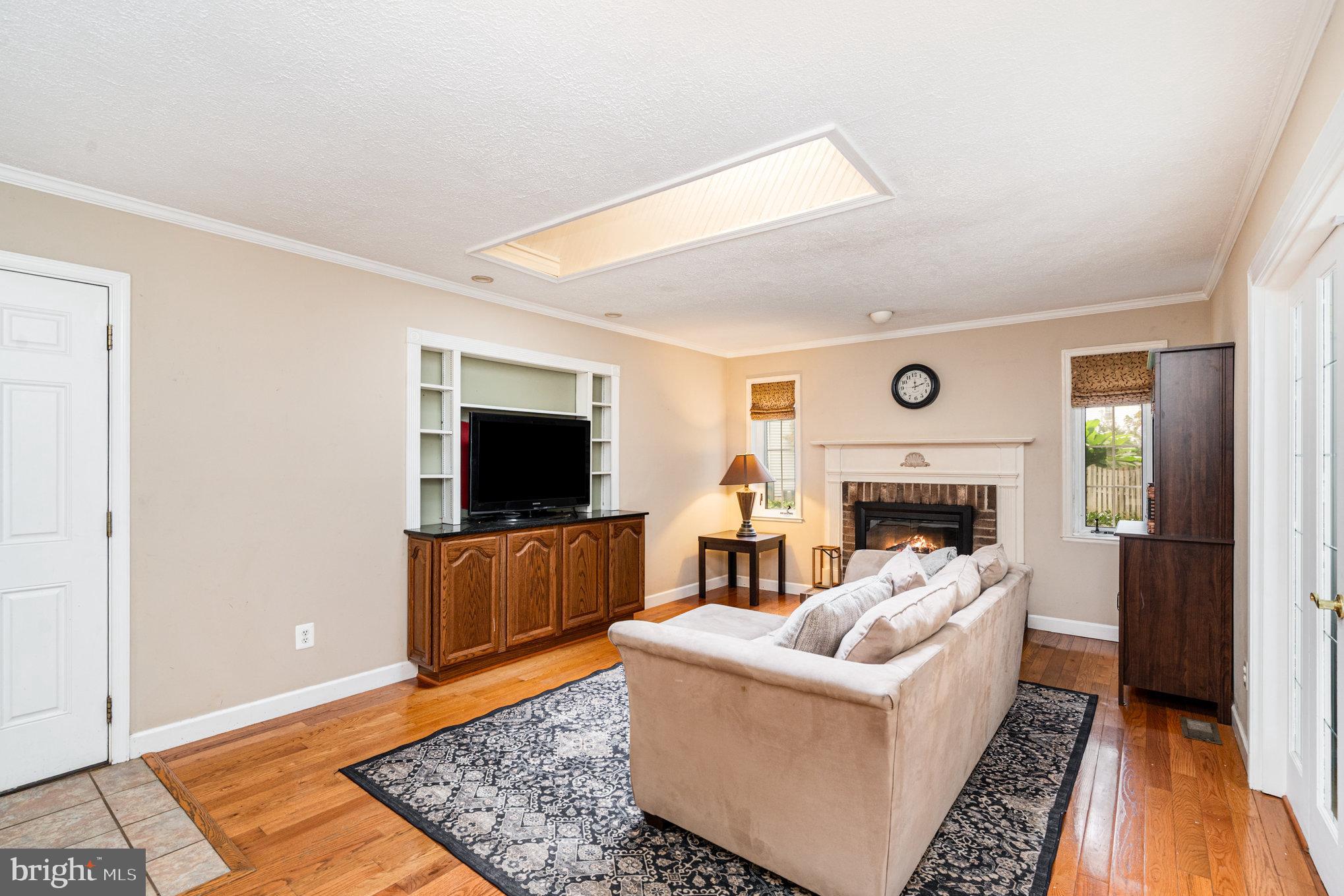 4530 Rincon Place Dumfries, VA 22025 - Photo 15 of 45 a living room with furniture and a fireplace
