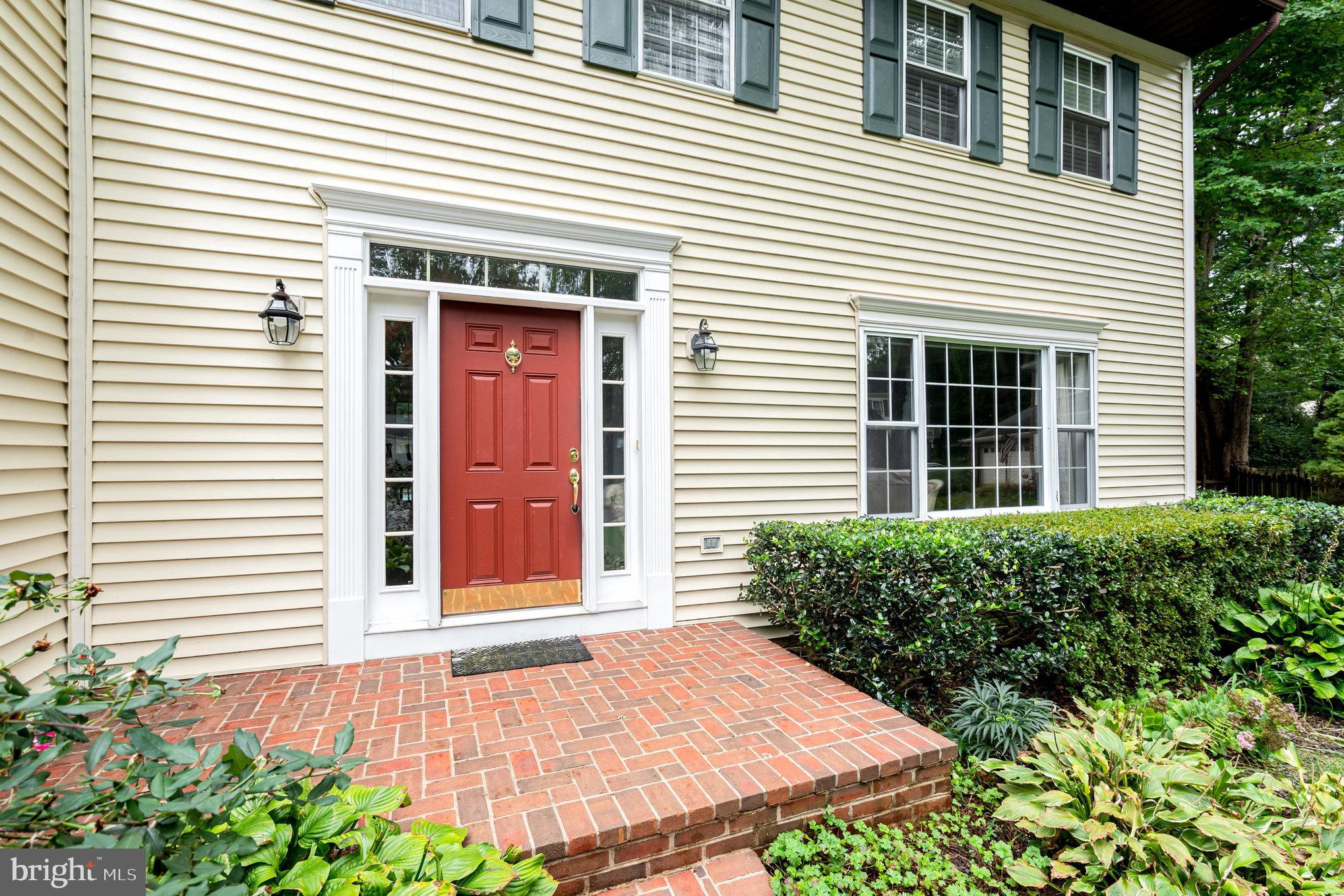 4530 Rincon Place Dumfries, VA 22025 - Photo 2 of 45 a view of a white house with a small window