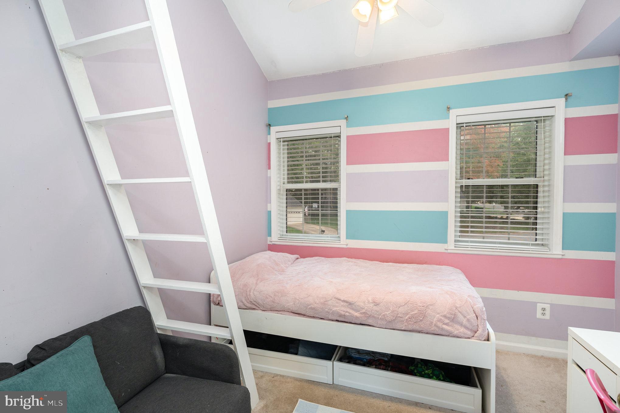 4530 Rincon Place Dumfries, VA 22025 - Photo 23 of 45 a bedroom with a bed and a window