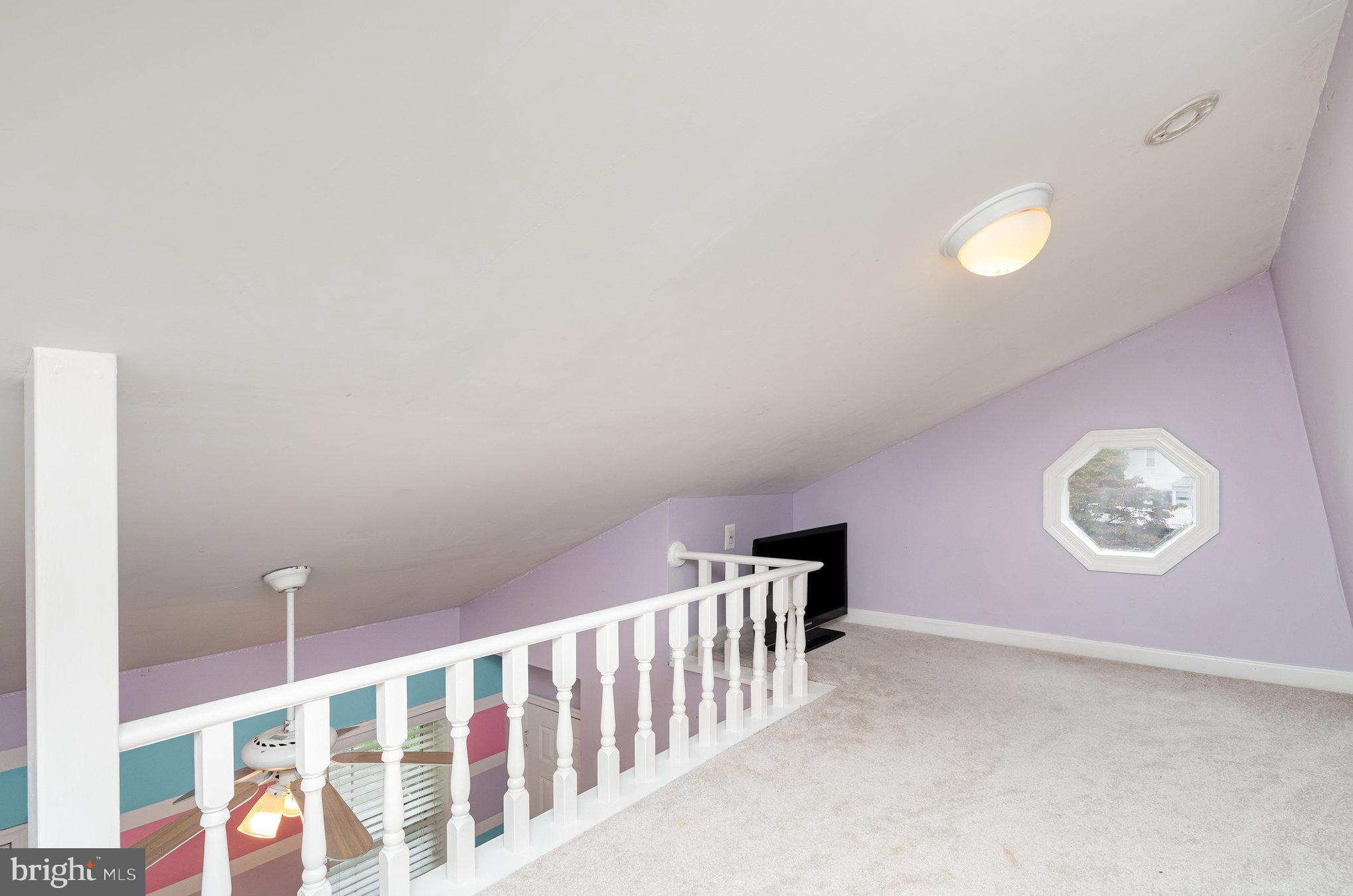 4530 Rincon Place Dumfries, VA 22025 - Photo 25 of 45 a view of staircase with wooden floor