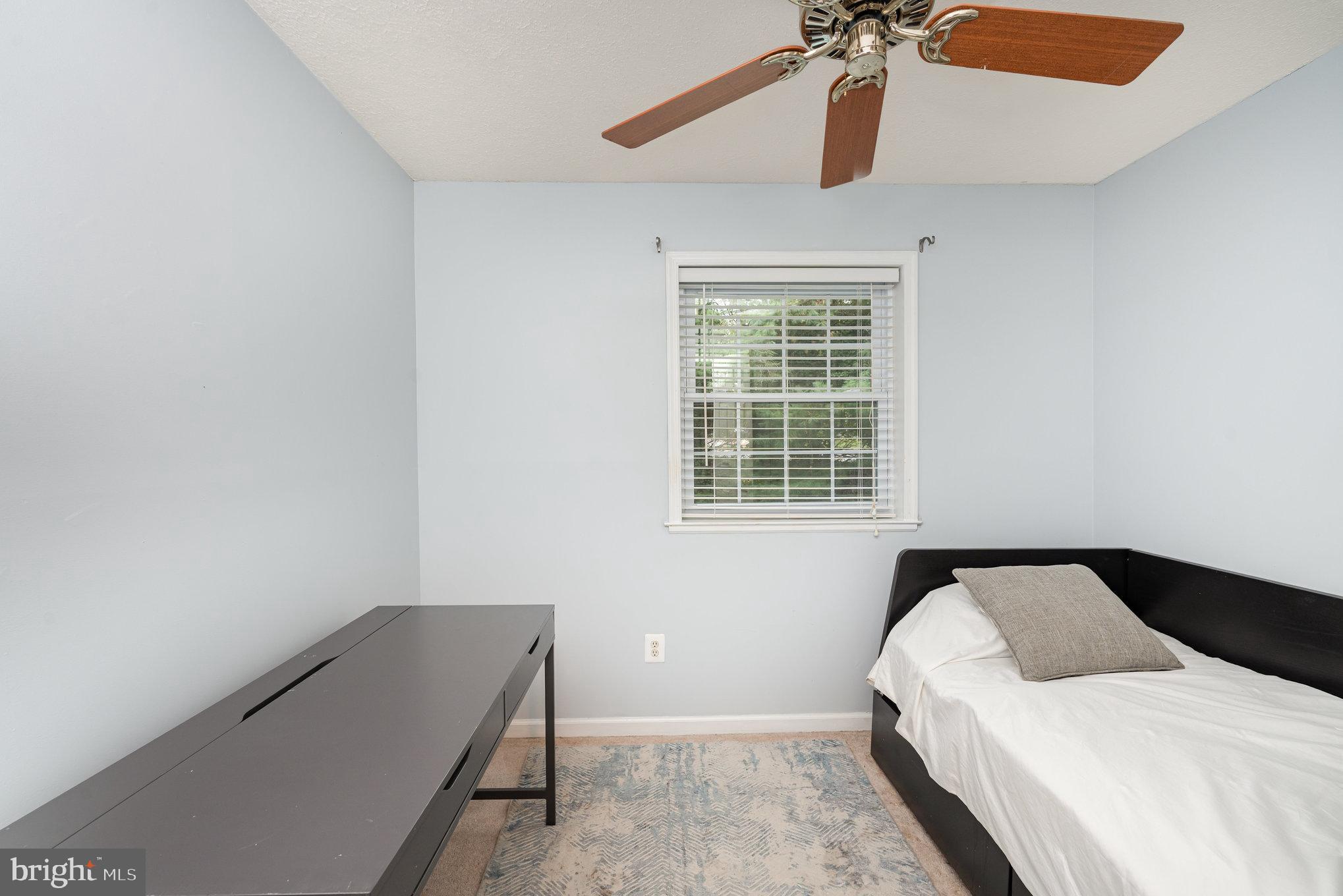 4530 Rincon Place Dumfries, VA 22025 - Photo 28 of 45 a bedroom with a bed and a window