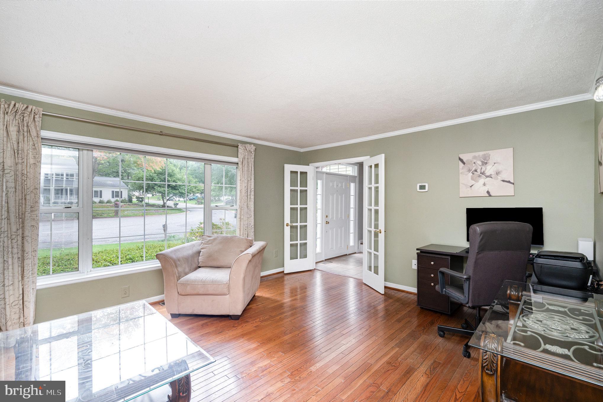 4530 Rincon Place Dumfries, VA 22025 - Photo 3 of 45 a living room with furniture or couch and a wooden floor