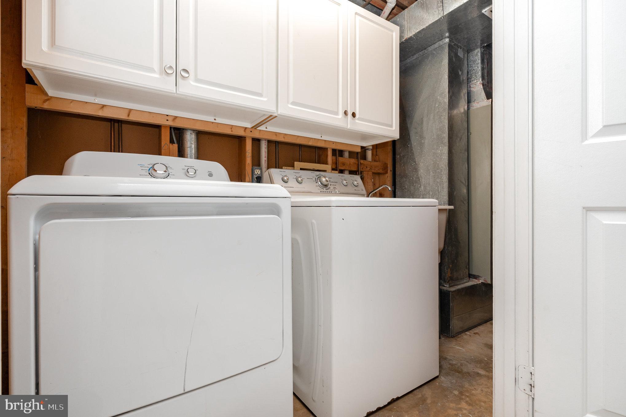 4530 Rincon Place Dumfries, VA 22025 - Photo 35 of 45 a utility room with dryer and washer
