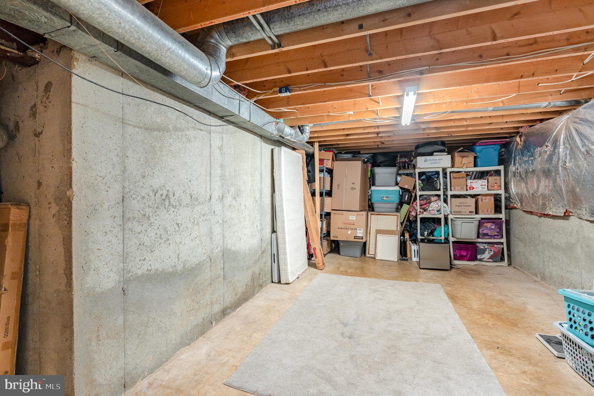 4530 Rincon Place Dumfries, VA 22025 - Photo 36 of 45 a view of a storage room with a lot of stuff