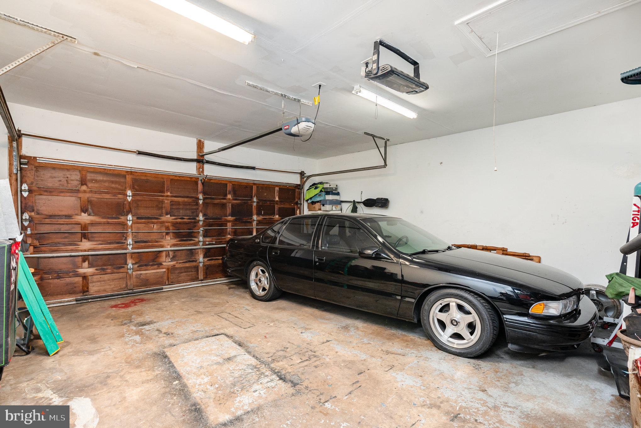 4530 Rincon Place Dumfries, VA 22025 - Photo 37 of 45 a car parked in a garage
