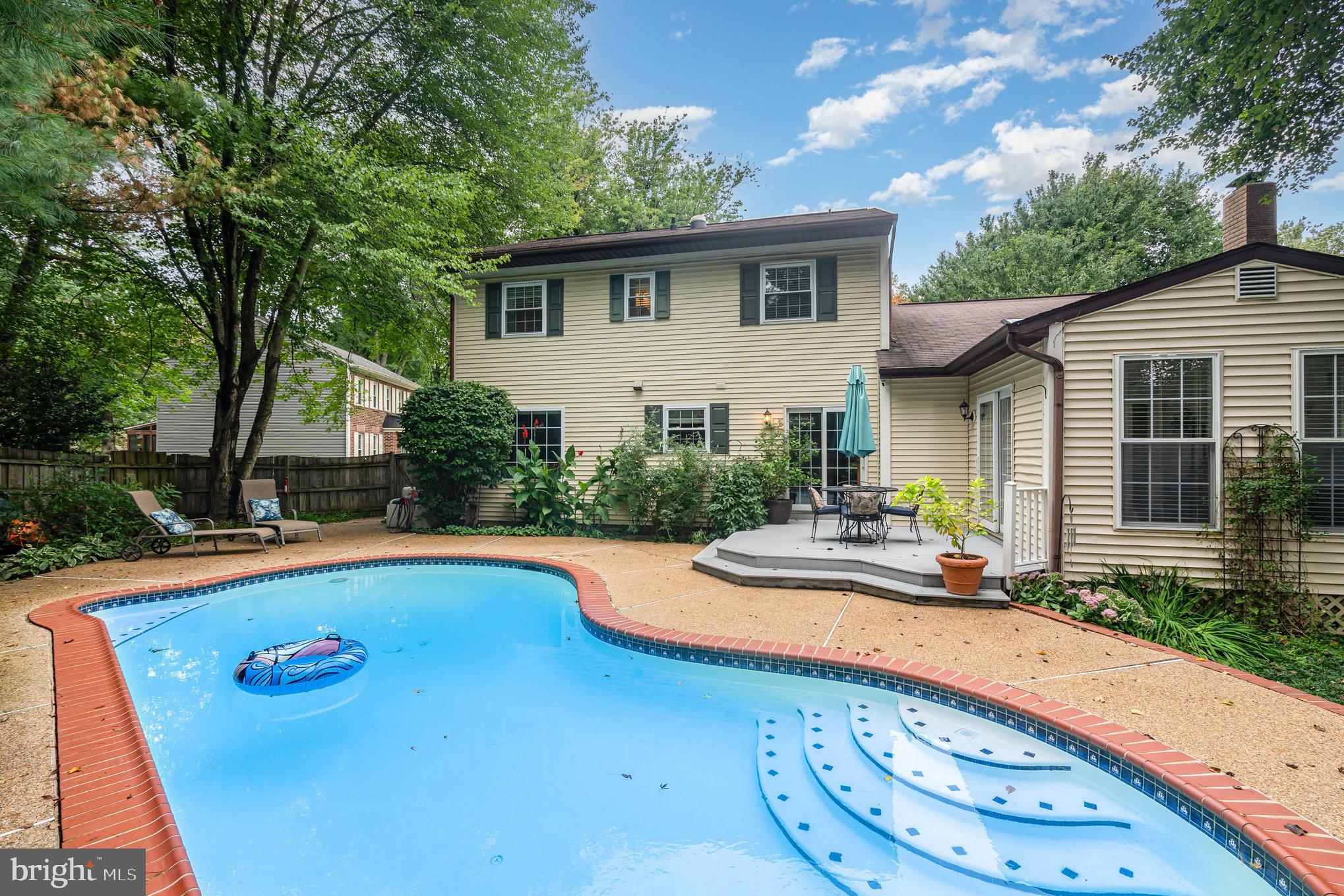 4530 Rincon Place Dumfries, VA 22025 - Photo 40 of 45 a view of a house with swimming pool and sitting area