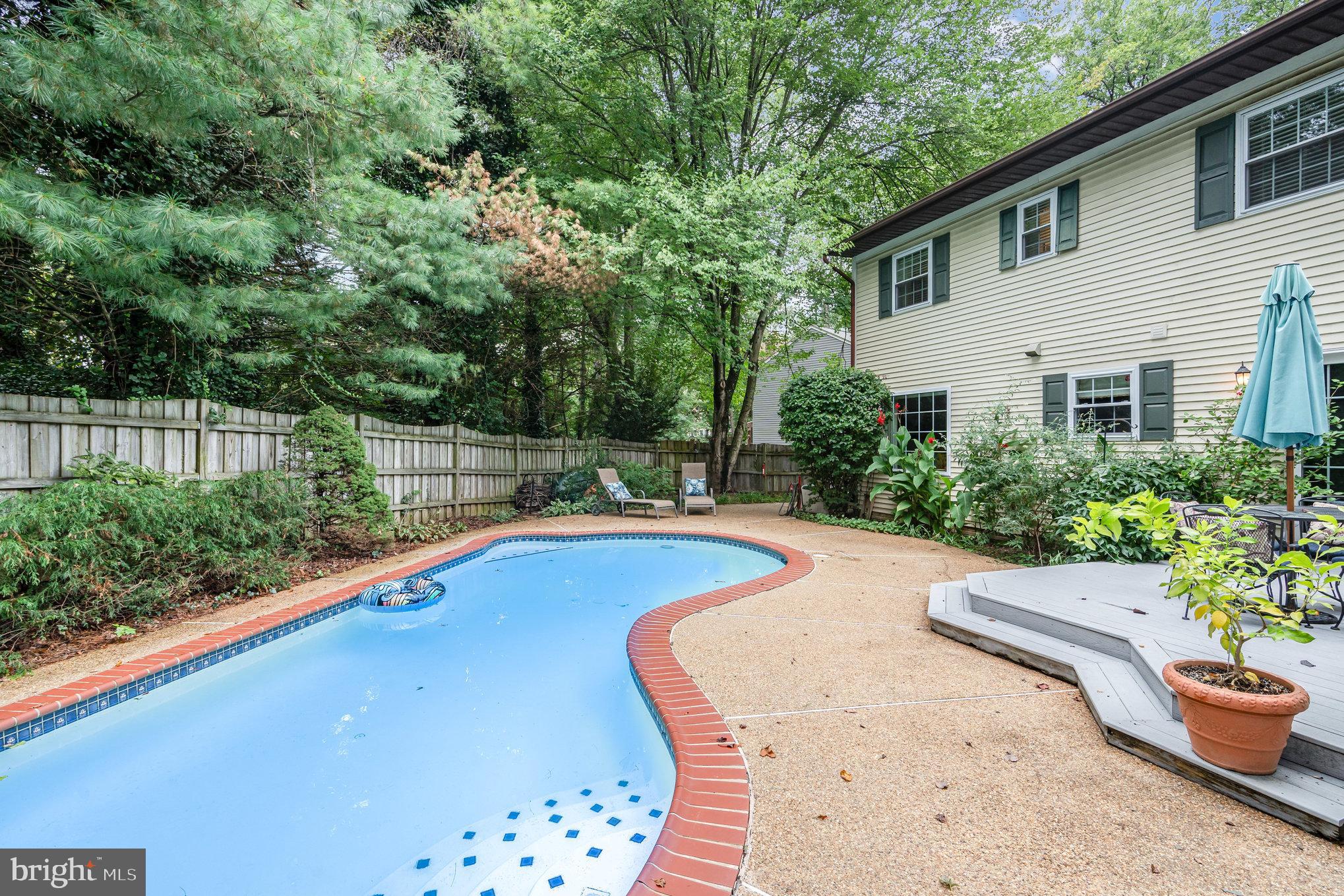 4530 Rincon Place Dumfries, VA 22025 - Photo 43 of 45 a view of a backyard with swimming pool