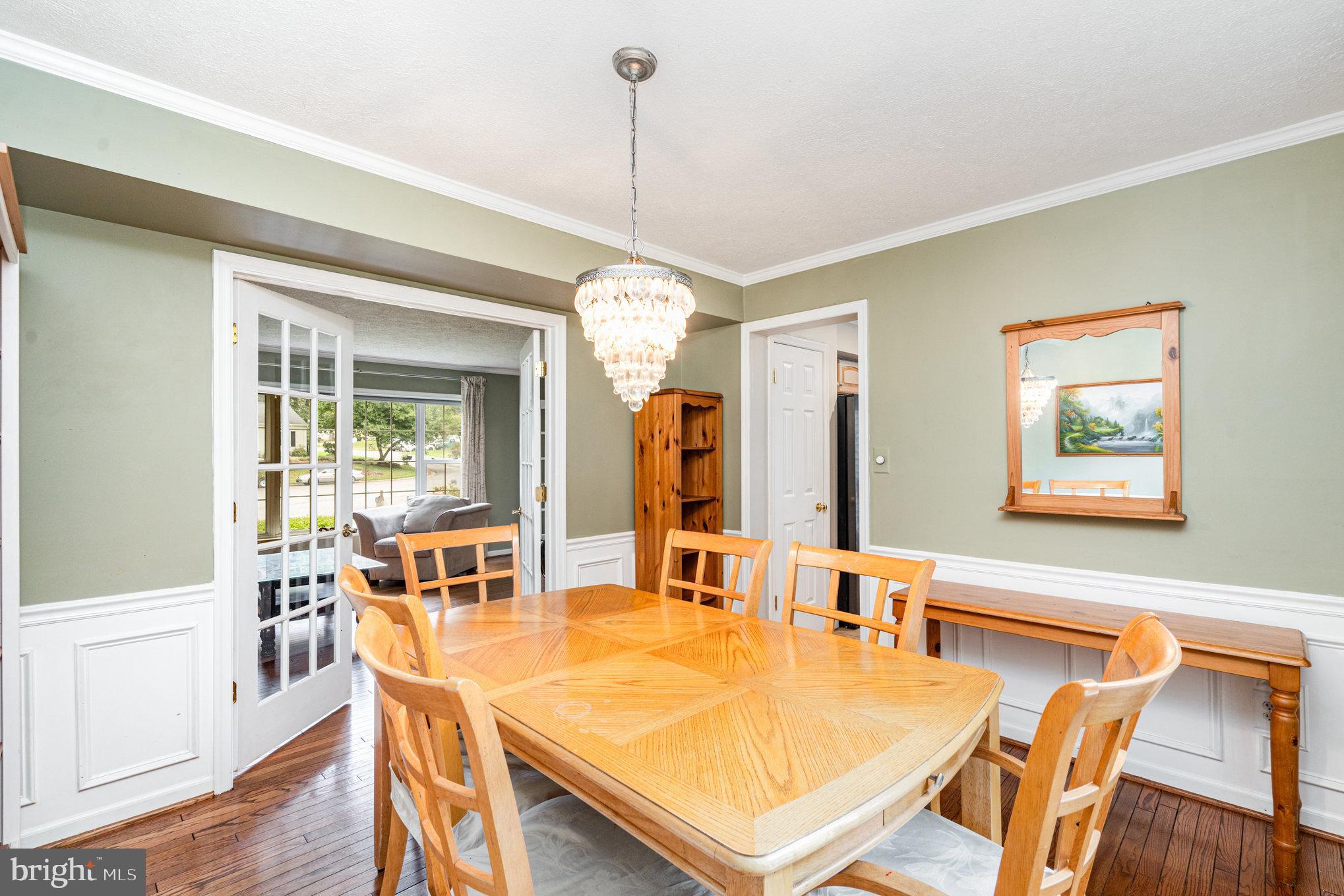 4530 Rincon Place Dumfries, VA 22025 - Photo 10 of 45 a dining room with furniture and window