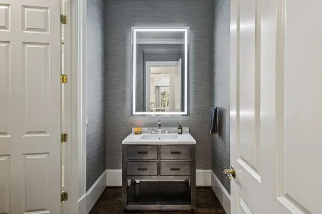 a view of a hallway with seating area