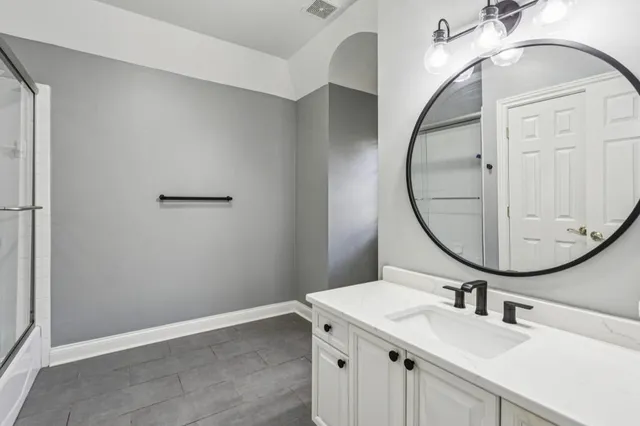 a living room with furniture fireplace and flat screen tv
