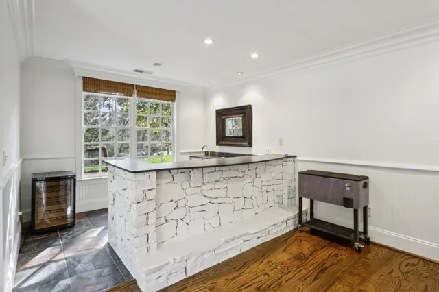 a view of a park with large trees