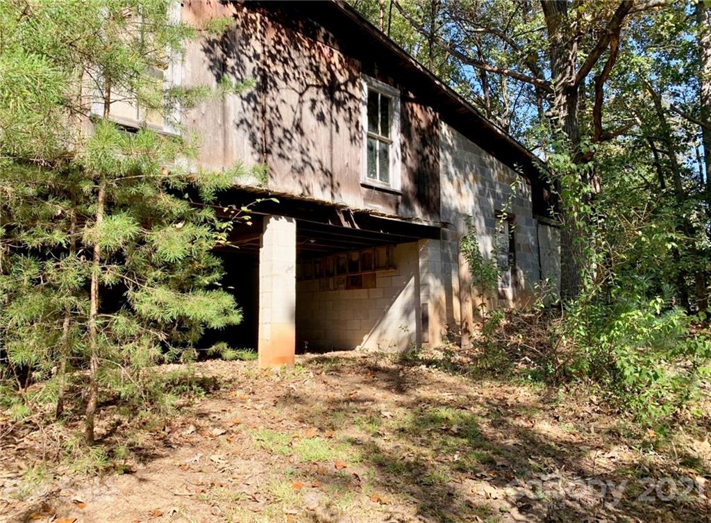 4771 Highway 9 Mill Spring, NC 28756 - Photo 33 of 35 a view of a house with a tree