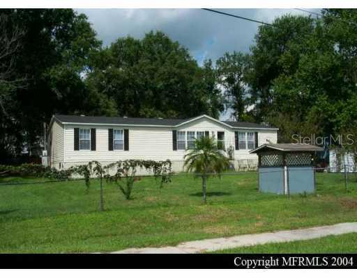332 Carpenter Road Orlando, FL 32833 - Photo 1 of 1 a front view of house with a garden