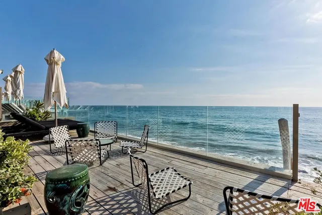 a view of a terrace with chairs
