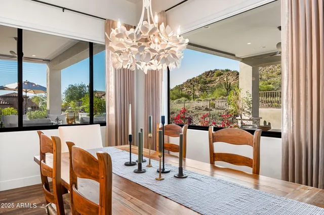 a view of parking garage with cars parked