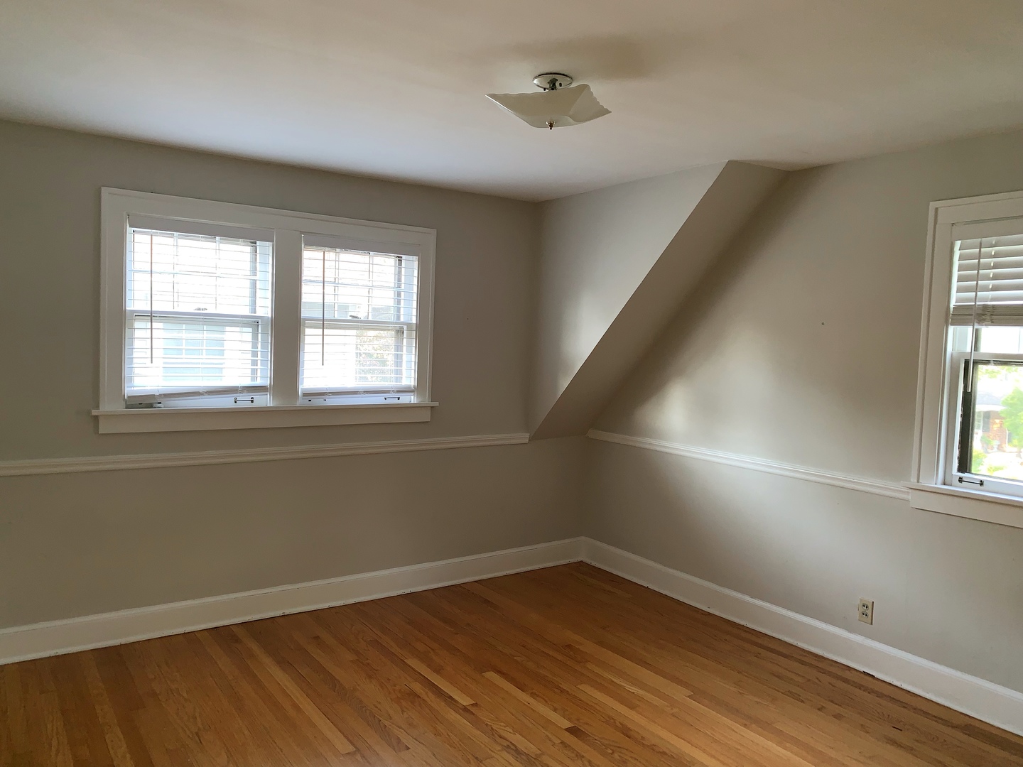 161 E Road Glen Ellyn, IL 60137 - Photo 12 of 13 an empty room with wooden floor and windows