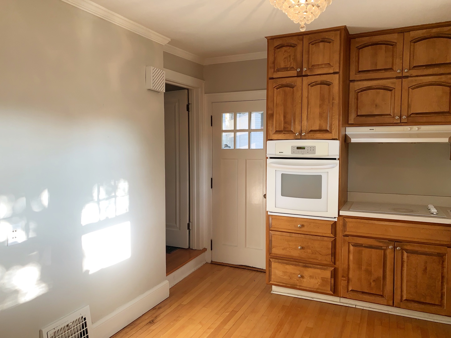 161 E Road Glen Ellyn, IL 60137 - Photo 8 of 13 a kitchen with cabinets and window