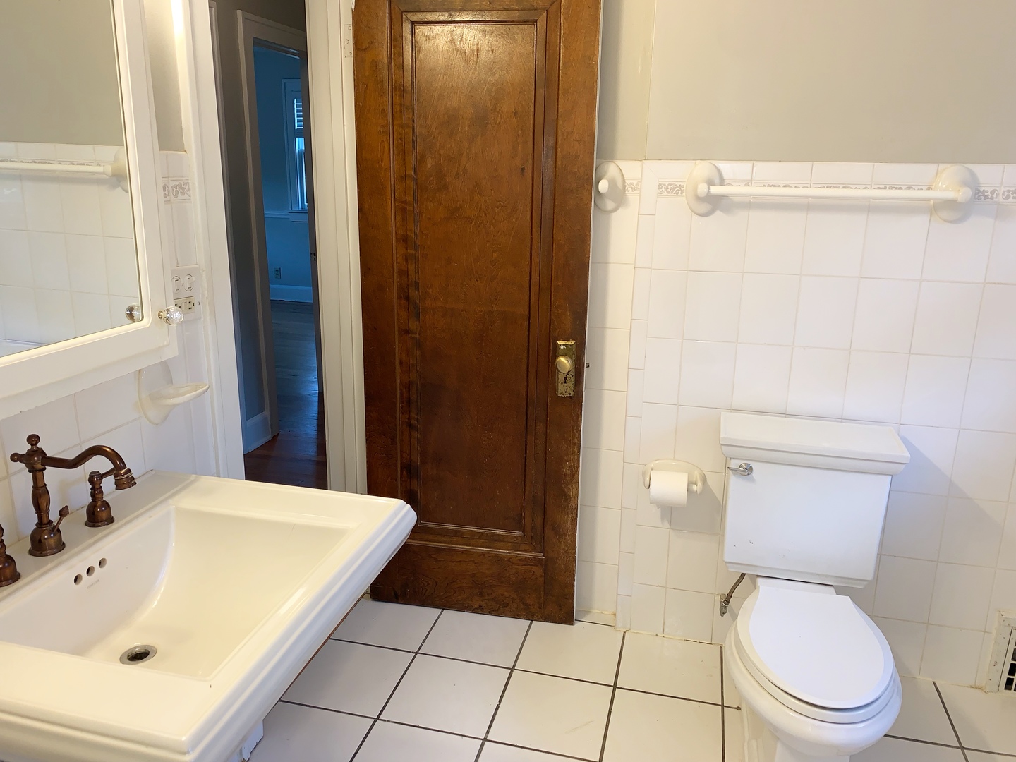 161 E Road Glen Ellyn, IL 60137 - Photo 9 of 13 a bathroom with a sink toilet and shower