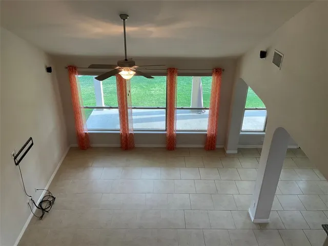 an empty room with windows