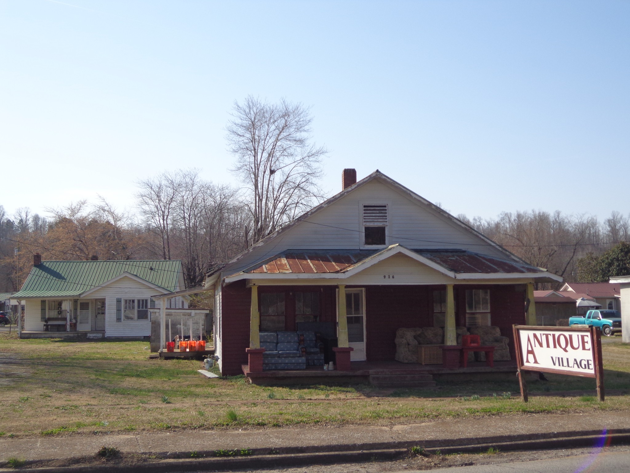 918 East Main Street Waverly, TN 37185 - Photo 10 of 14 a front view of a house with a yard
