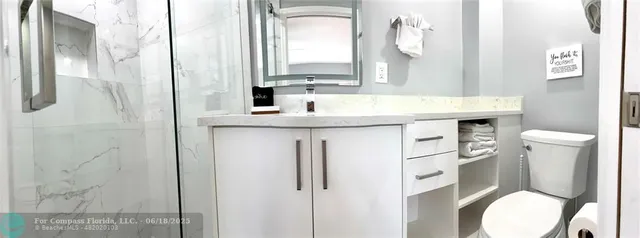 a living room with furniture and a chair