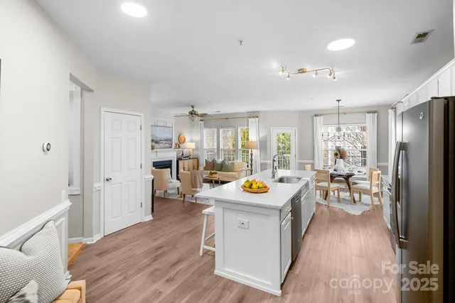 a very nice looking dining room with a table and chairs