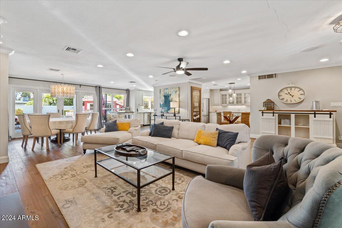 3841 East Elm Street Phoenix, AZ 85018 - Photo 13 of 72 a living room with furniture kitchen view and a table