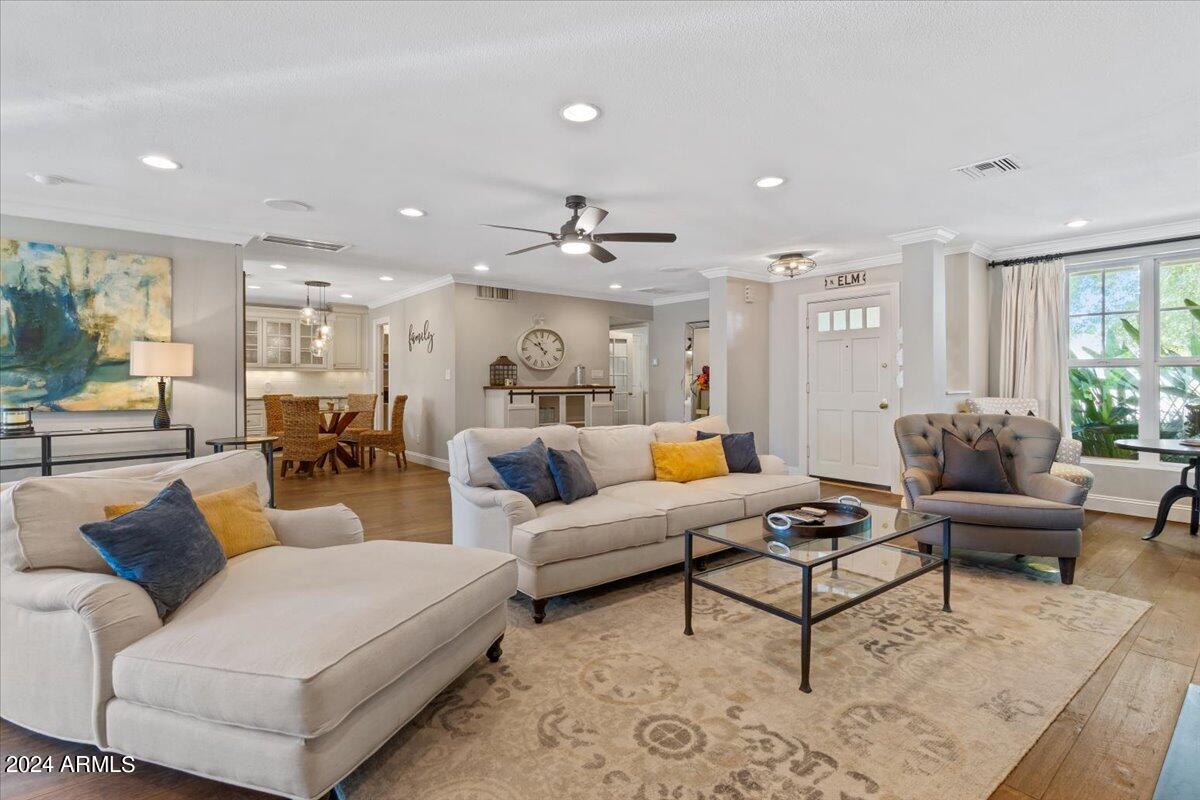 3841 East Elm Street Phoenix, AZ 85018 - Photo 15 of 72 a living room with furniture and a large window