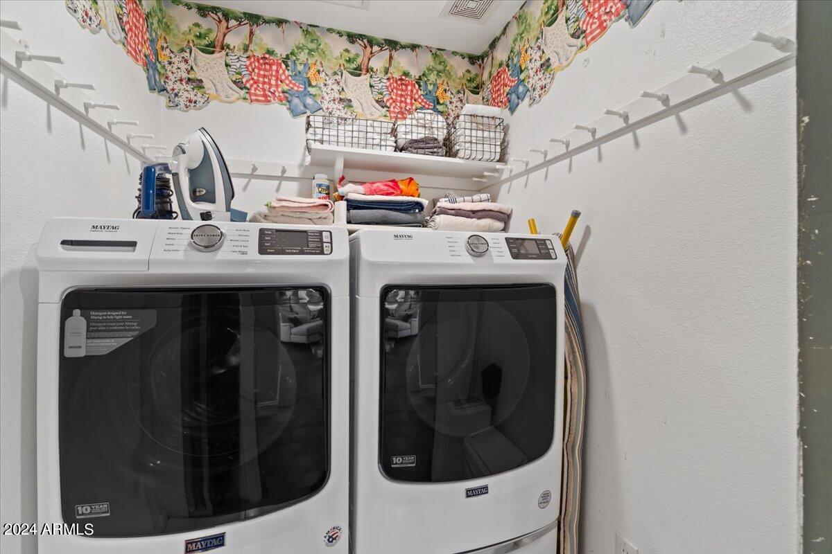 3841 East Elm Street Phoenix, AZ 85018 - Photo 27 of 72 a utility room with dryer and washer