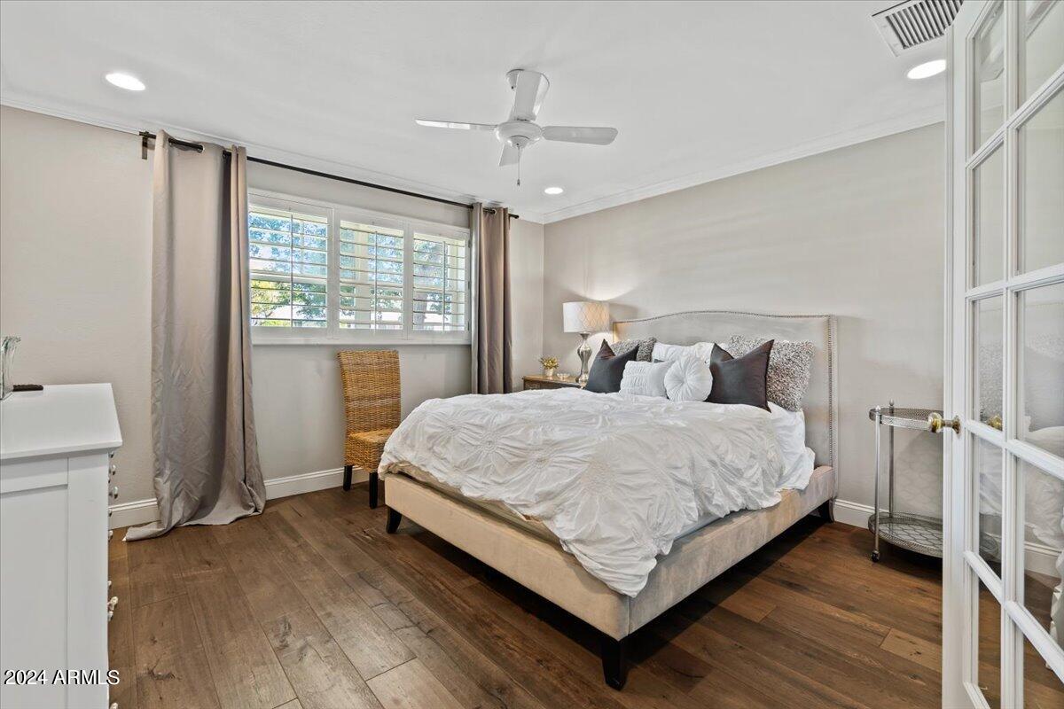 3841 East Elm Street Phoenix, AZ 85018 - Photo 34 of 72 a bedroom with a bed and window