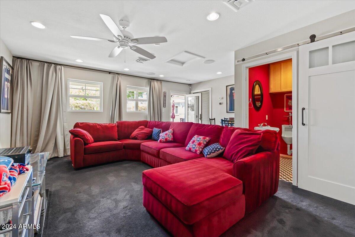 3841 East Elm Street Phoenix, AZ 85018 - Photo 55 of 72 a living room with furniture ceiling fan and a window