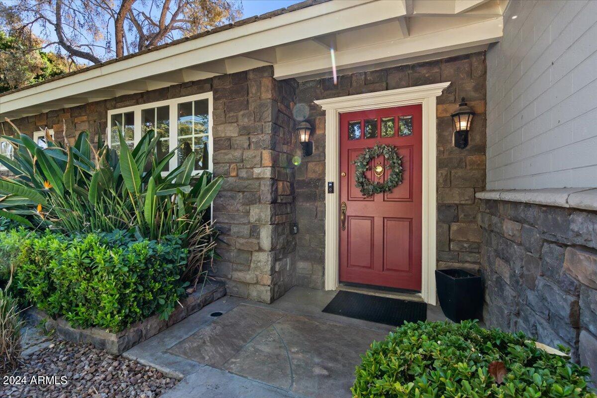3841 East Elm Street Phoenix, AZ 85018 - Photo 8 of 72 a front view of a house with garden