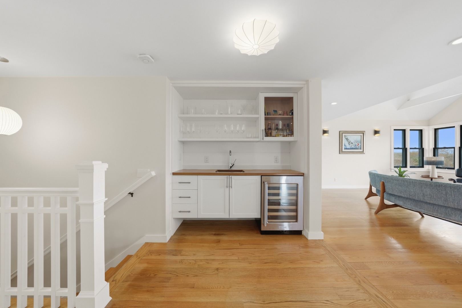 247 Polpis Road Nantucket, MA 02554 - Photo 17 of 52 a living room with furniture and a kitchen