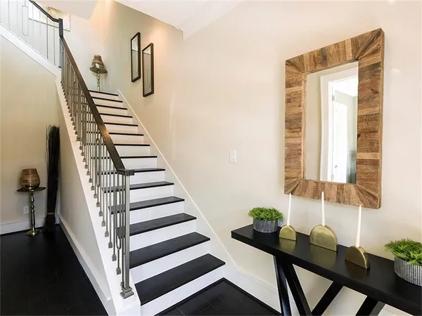a view of a hallway with seating area