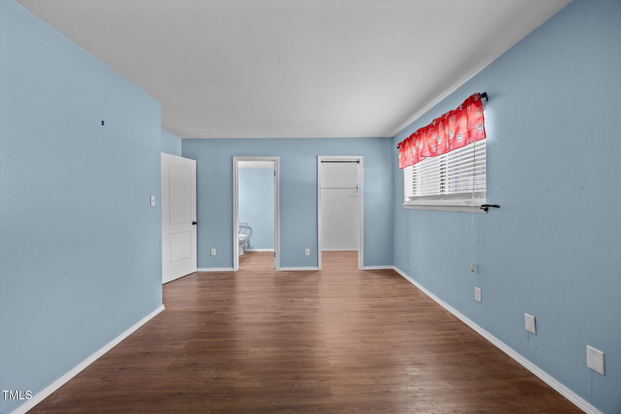 1010 Sandlin Place, Unit D Raleigh, NC 27606 - Photo 16 of 21 Primary Bedroom